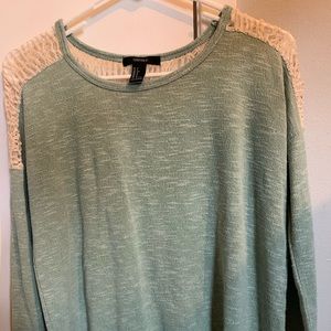 Green shirt with lace on the back shoot me and offer!